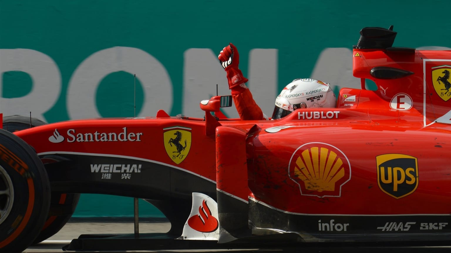 Vettel stuns Mercedes with Ferrari win at Sepang