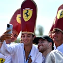 The legendary “Pope lads” returned – papal hats and Ferrari blessings included – keeping Monza’s fan theatre alive. Swipe for more