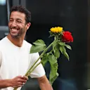 ZANDVOORT, NETHERLANDS - AUGUST 25: Daniel Ricciardo of Australia and Scuderia AlphaTauri holds