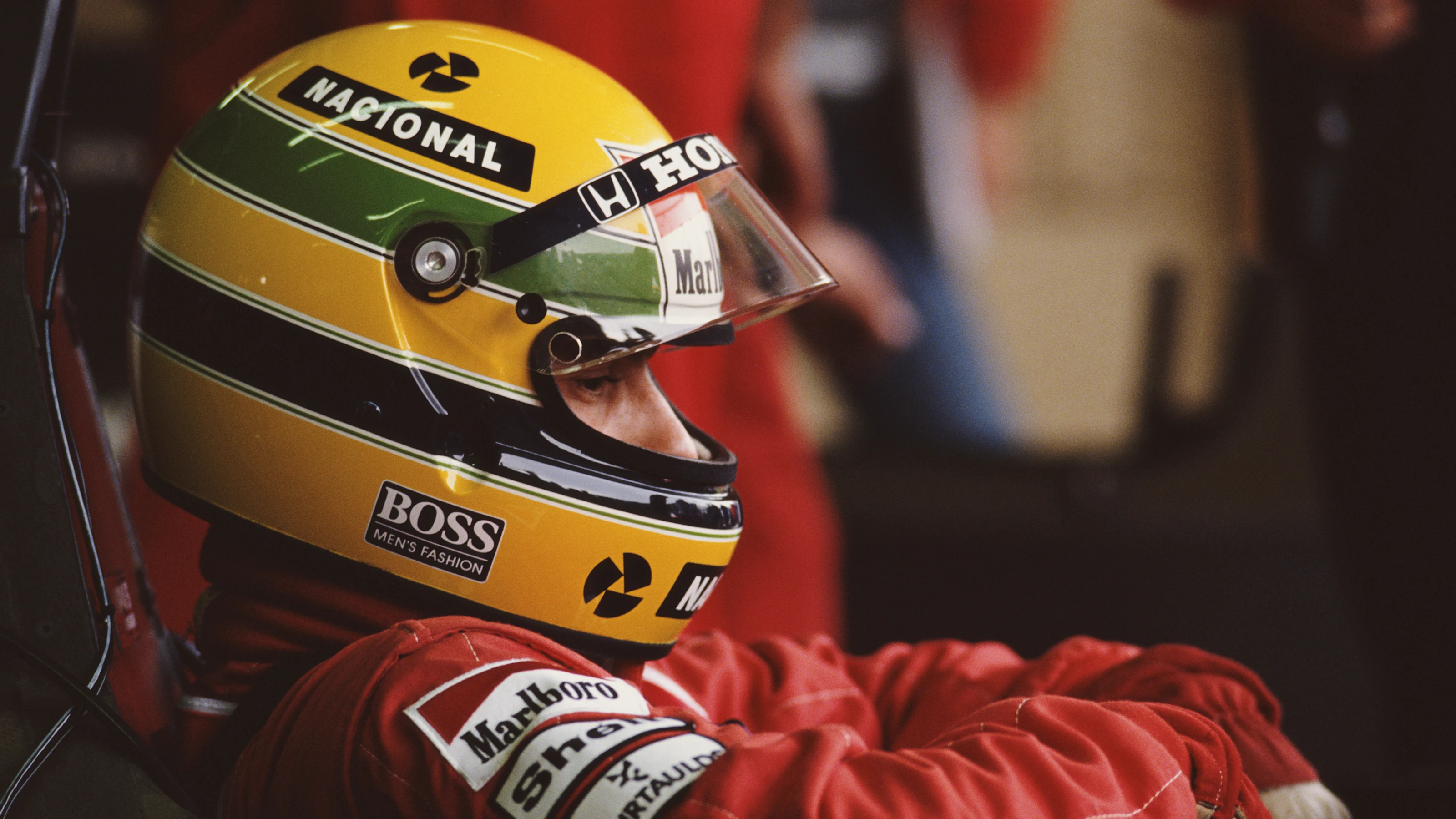 Ayrton Senna of Brazil sits aboard the #1 Honda Marlboro McLaren McLaren MP4/5 Honda V10 before the