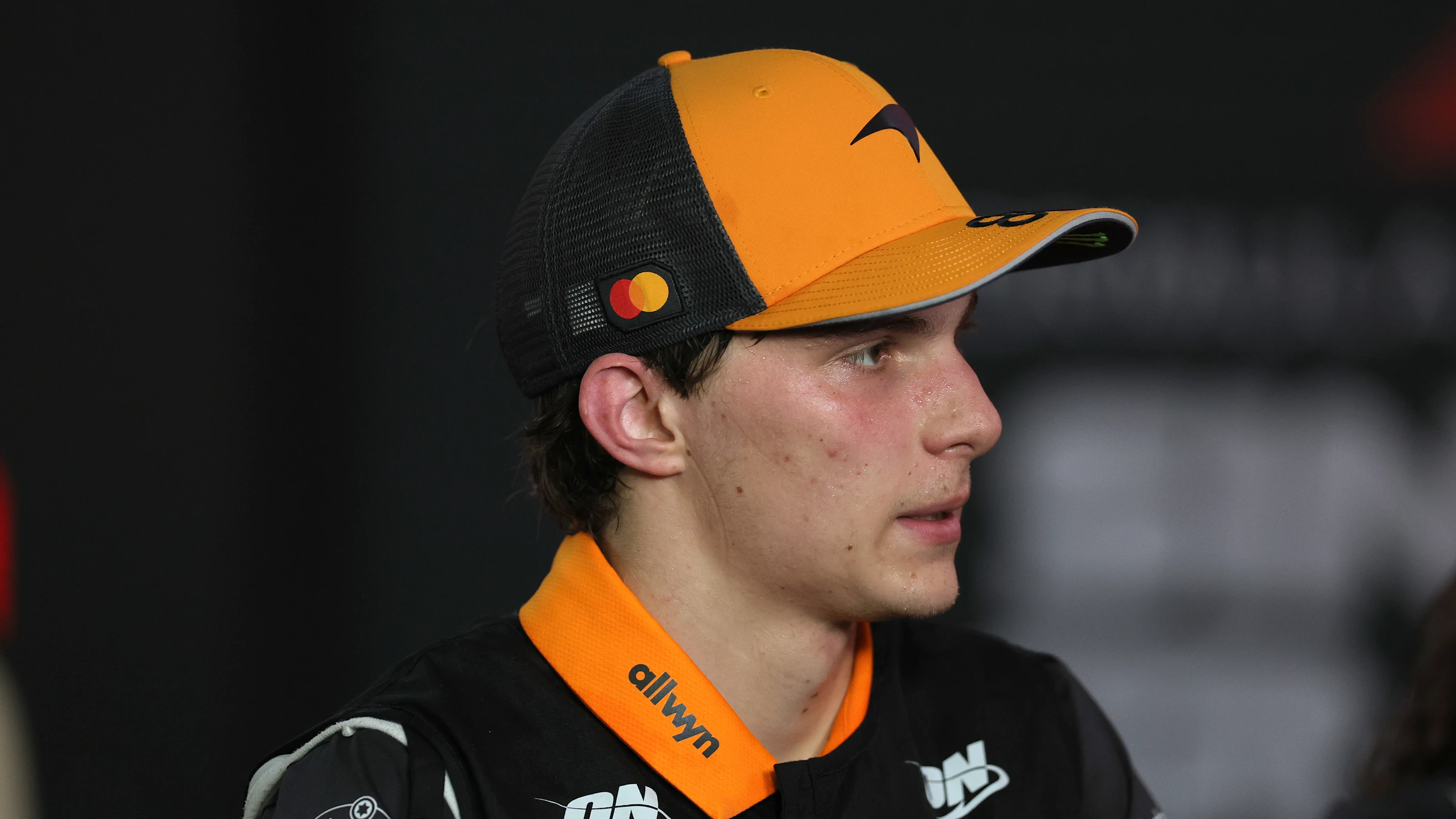 SINGAPORE, SINGAPORE - OCTOBER 05: Fourth placed Oscar Piastri of Australia and McLaren talks to