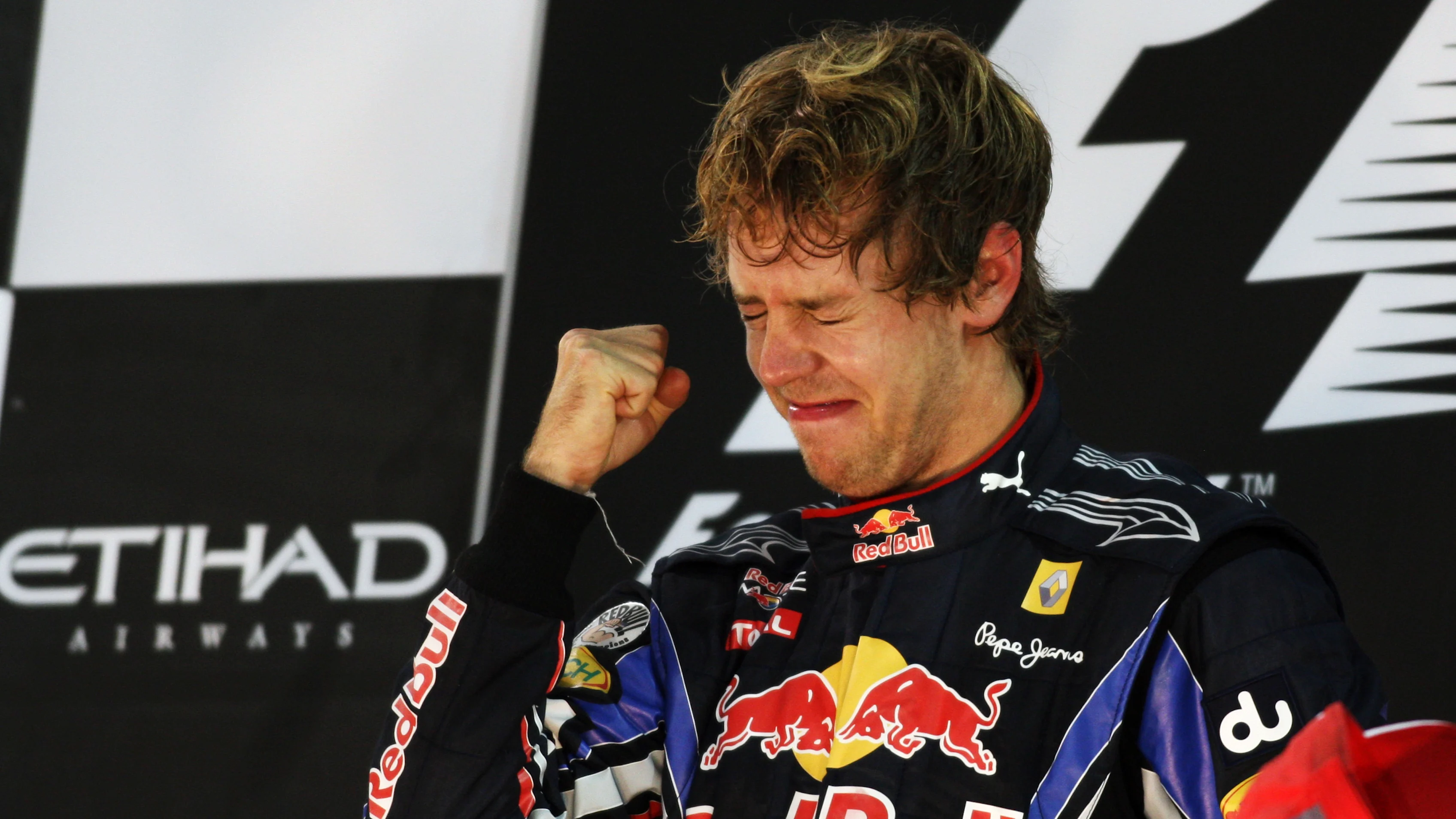 Race winner and 2010 Champion Sebastian Vettel (GER) Red Bull Racing celebrates on the