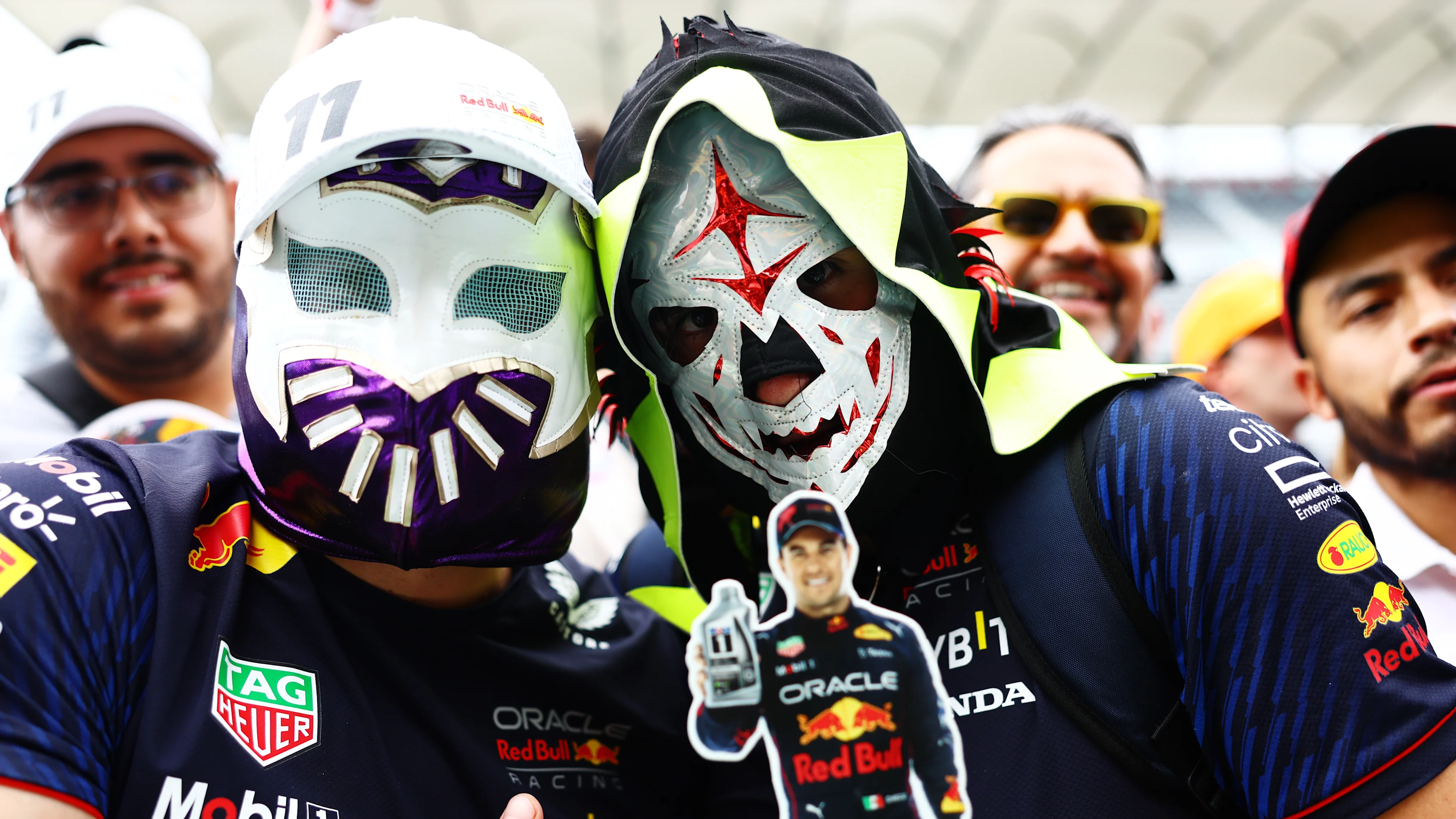 MEXICO CITY, MEXICO - OCTOBER 26: Sergio Perez of Mexico and Oracle Red Bull Racing fans show their