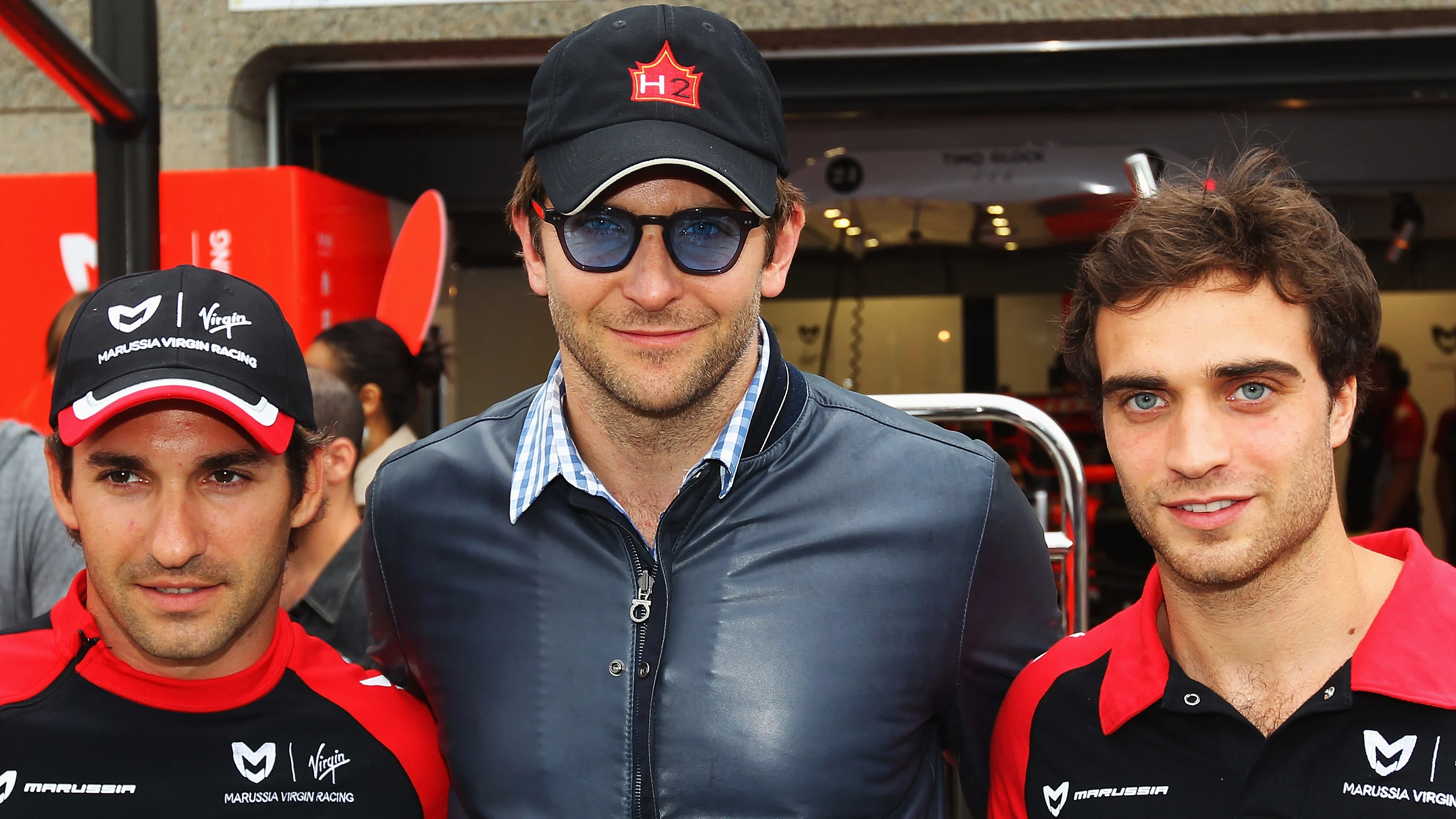 MONTREAL, CANADA - JUNE 11:  Actor Bradley Cooper (C) is seen with Virgin Racing drivers Timo Glock