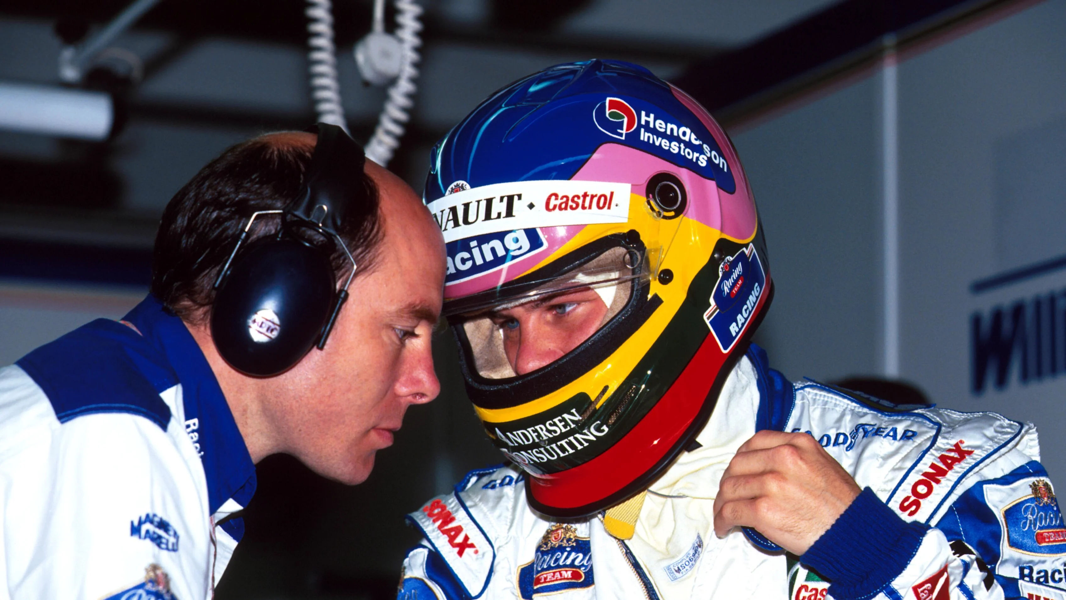 Jacques Villeneuve (CDN) Williams FW19 with his engineer Jock Clear (GBR) left Formula One World
