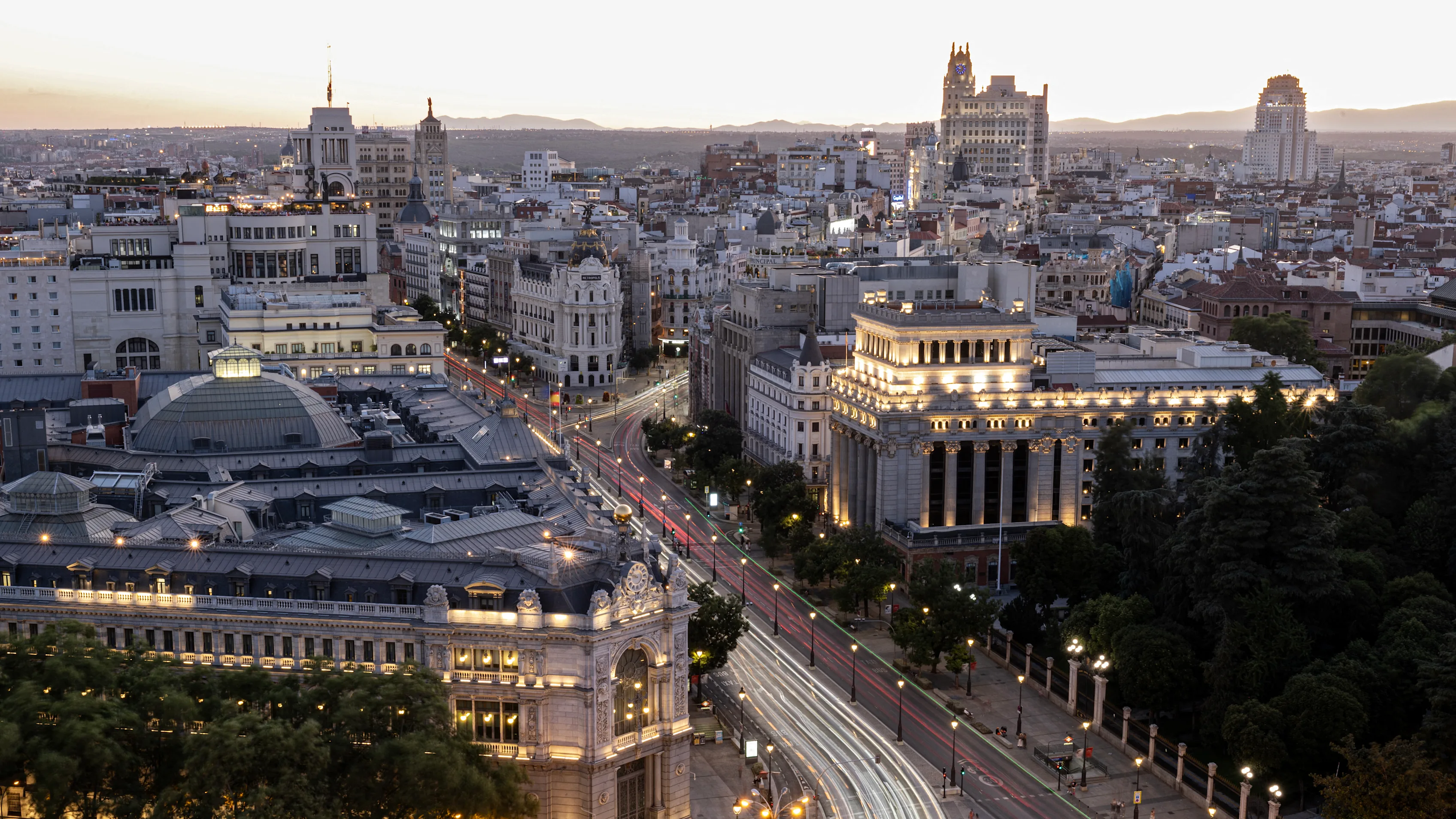 A general view of Madrid cityscape illuminated at dusk is pictured on July 24, 2025. (Photo by