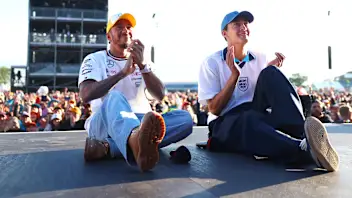 NORTHAMPTON, ENGLAND - JULY 06: Lewis Hamilton of Great Britain and Mercedes and George Russell of