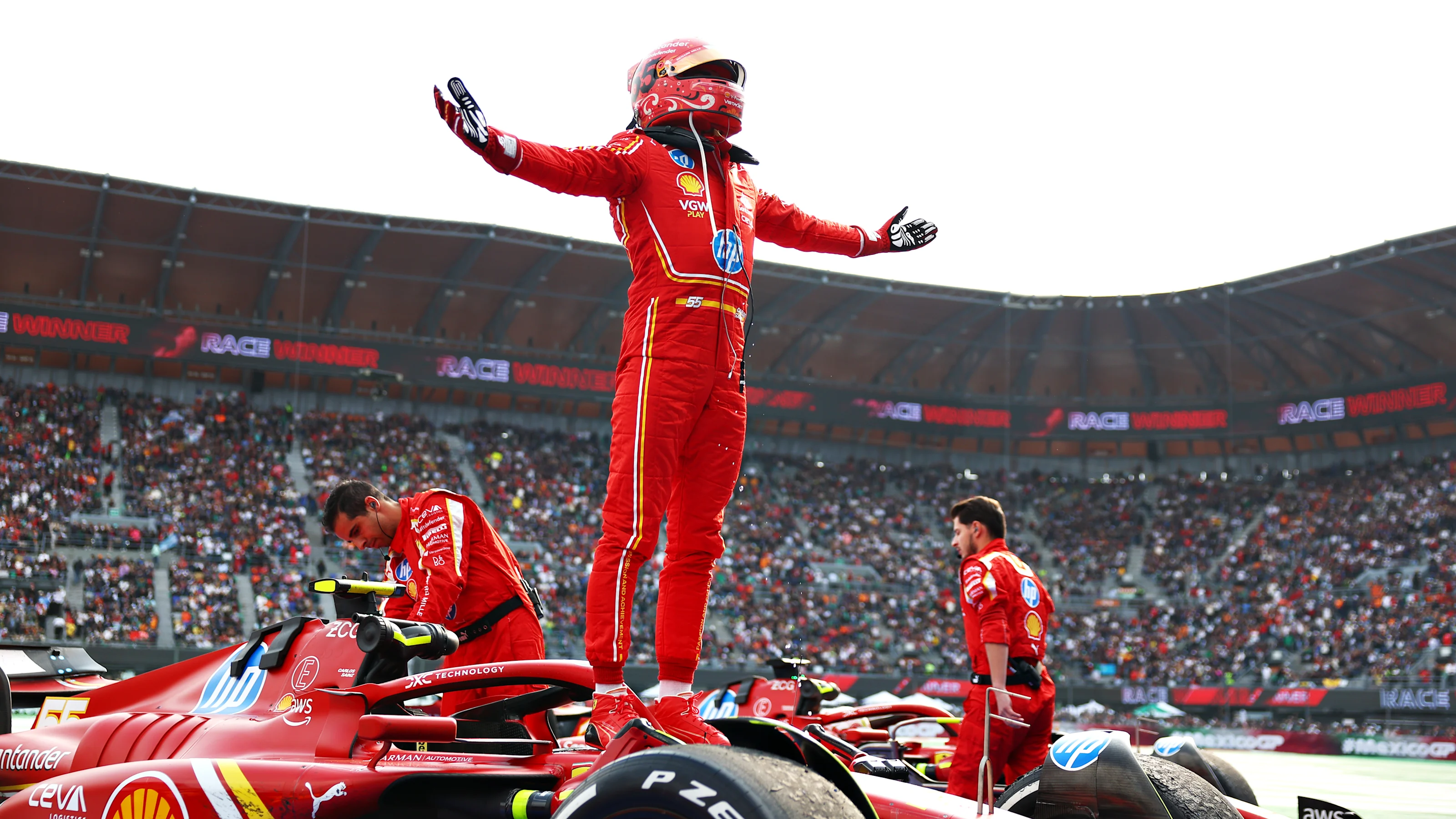 MEXICO CITY, MEXICO - OCTOBER 27: Race winner Carlos Sainz of Spain and Ferrari celebrates in parc