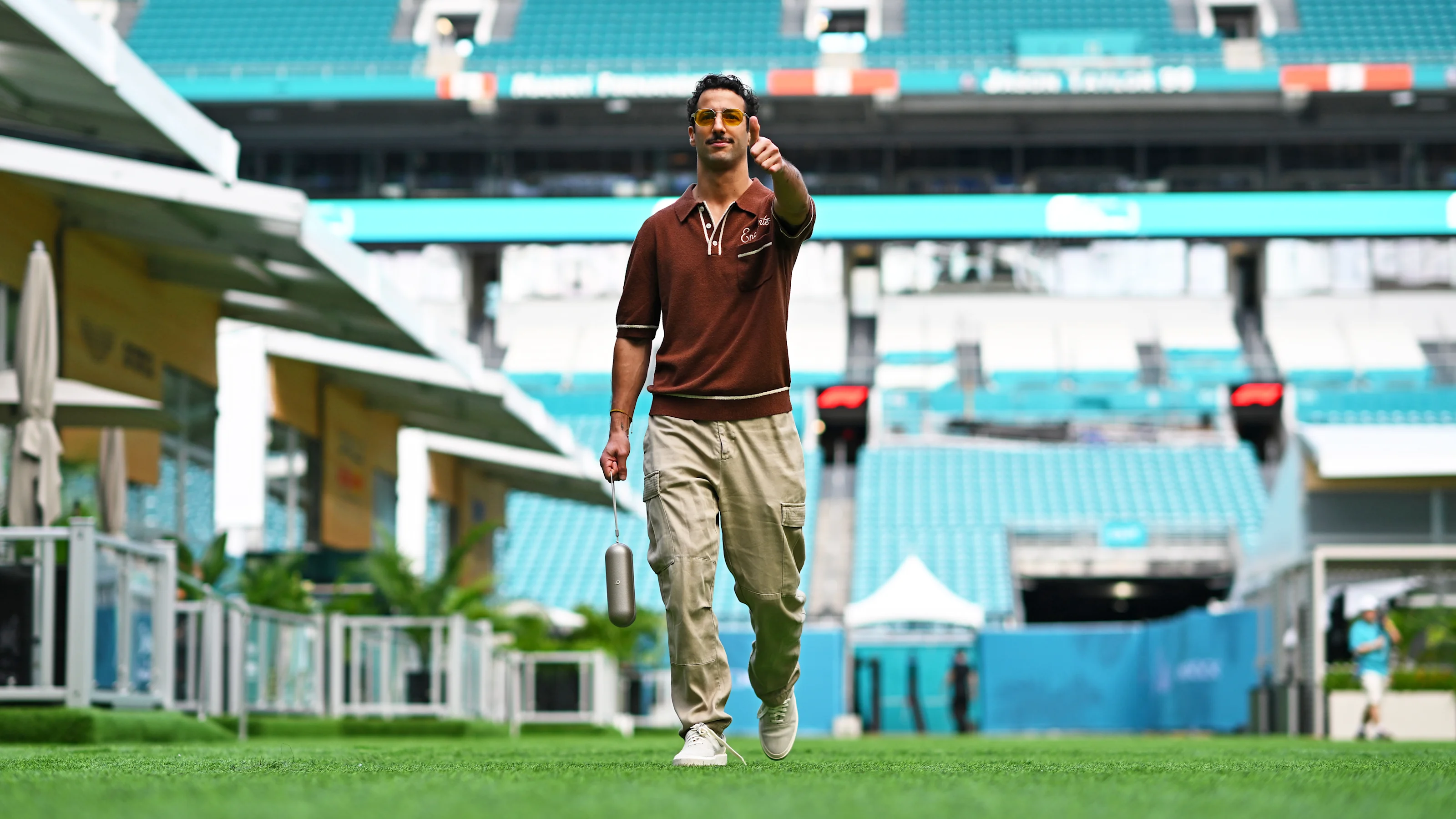 MIAMI, FLORIDA - MAY 02: Daniel Ricciardo of Australia and Visa Cash App RB walks in the Paddock