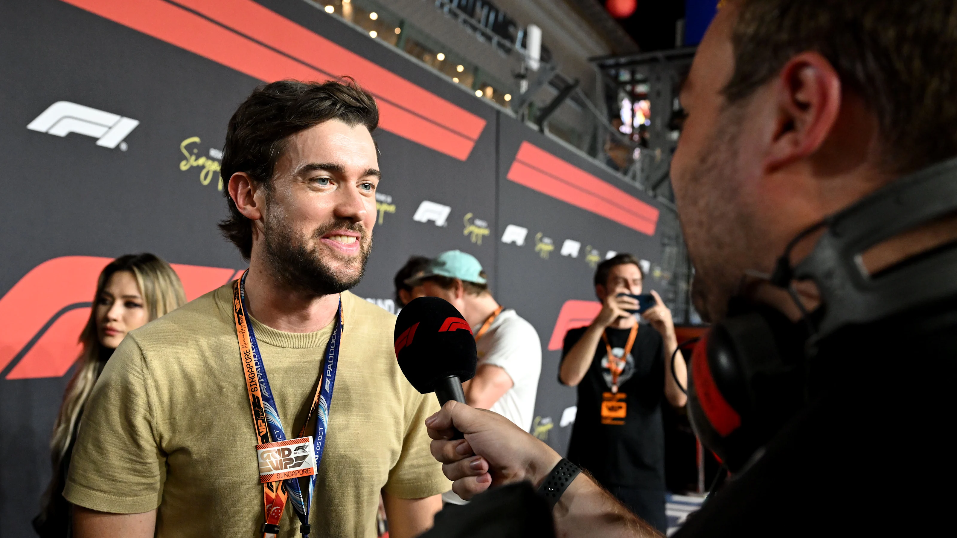 SINGAPORE, SINGAPORE - OCTOBER 05: Jack Whitehall on the grid during the F1 Grand Prix of Singapore