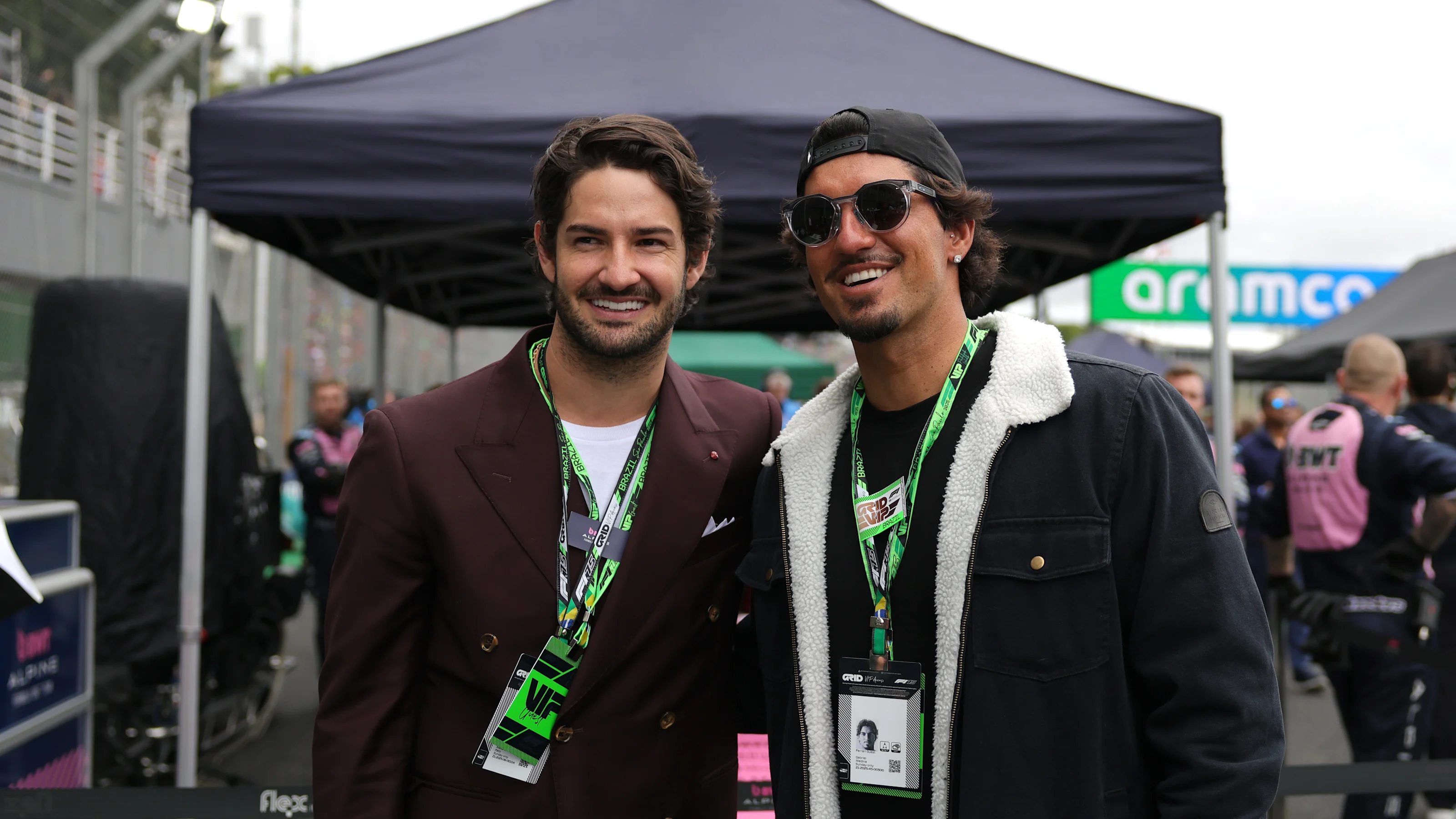 SAO PAULO, BRAZIL - NOVEMBER 09: Alexandre Pato and Gabriel Medina on the grid prior to the F1