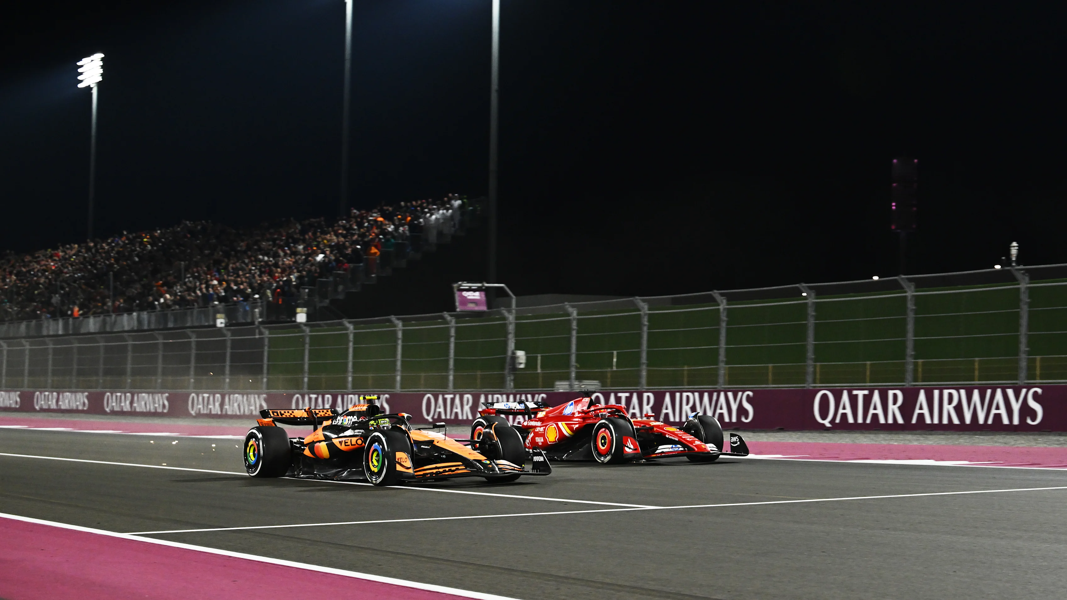 LUSAIL CITY, QATAR - DECEMBER 01: Lando Norris of Great Britain driving the (4) McLaren MCL38