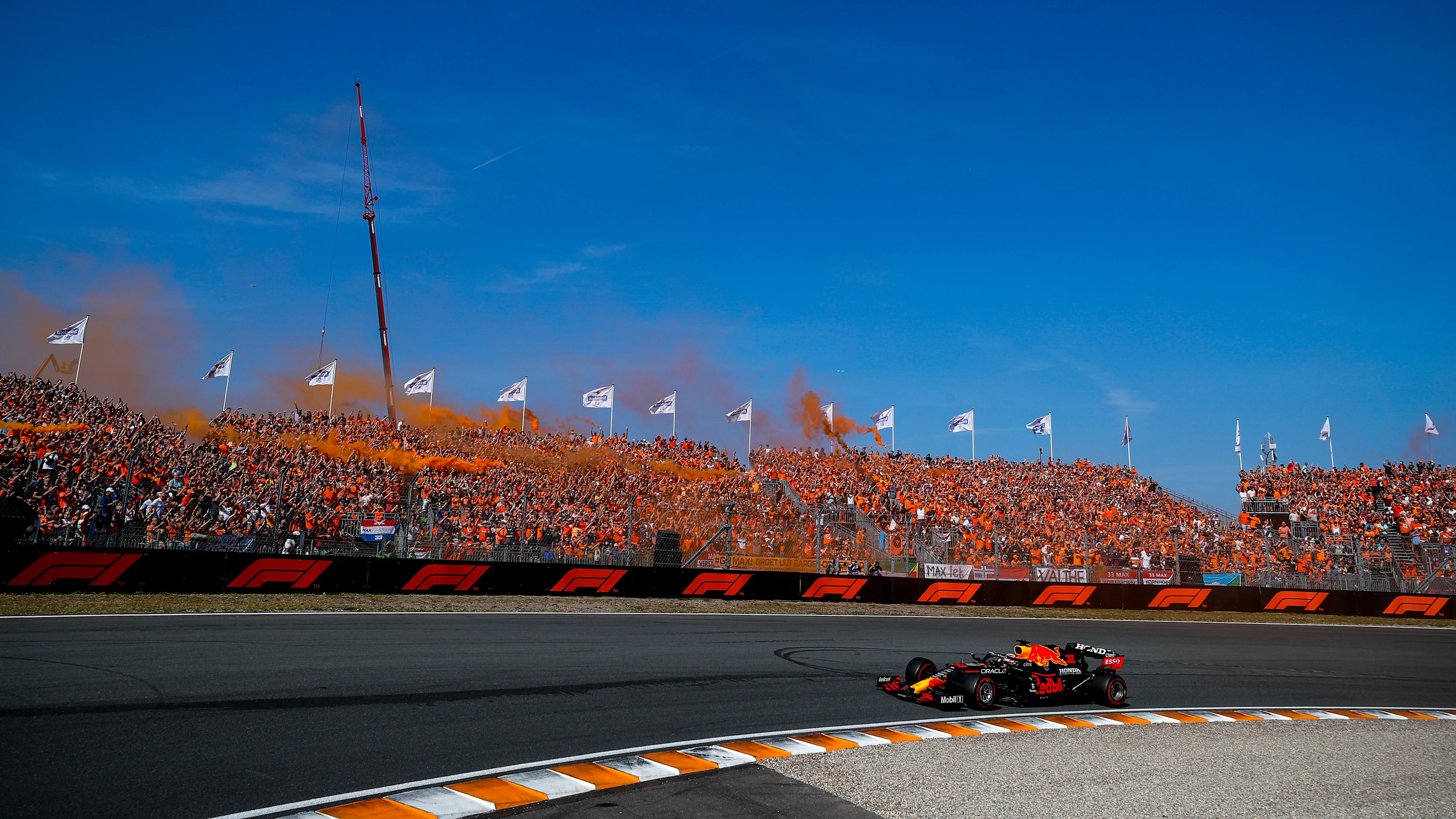 Verstappen celebrates with the Orange Army on his victory lap at the 2021 Dutch Grand Prix