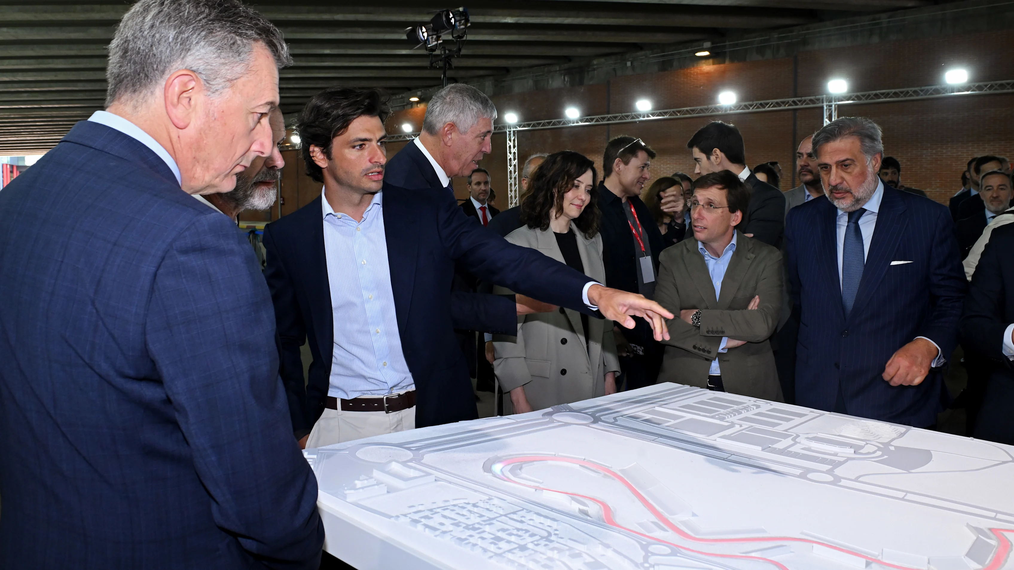 MADRID, SPAIN - APRIL 25: Carlos Sainz of Spain and Williams points at a model of the Formula 1
