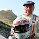 Sir Jackie Stewart and his signature Tartan helmet. Swipe for more images