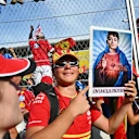 Ferrari devotion in full view – Leclerc immortalised in fan art held aloft during podium celebrations