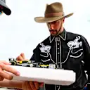 Always finding time for the fans, Ricciardo signs a mini car for one lucky supporter