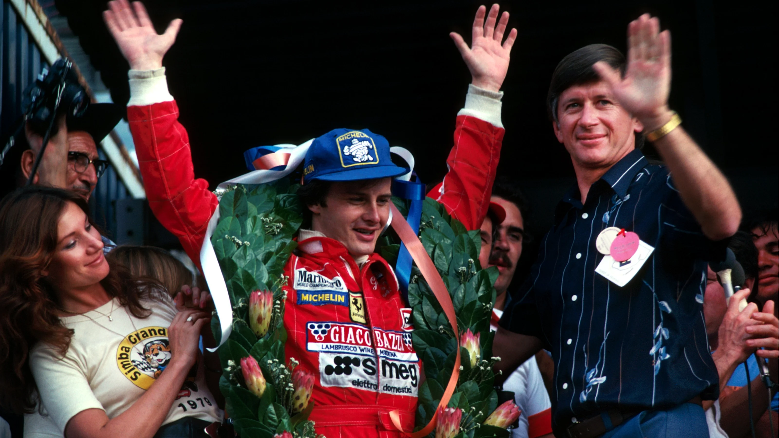 Race winner Gilles Villeneuve (CDN) celebrates on the podium. South African Grand Prix, Rd 3,