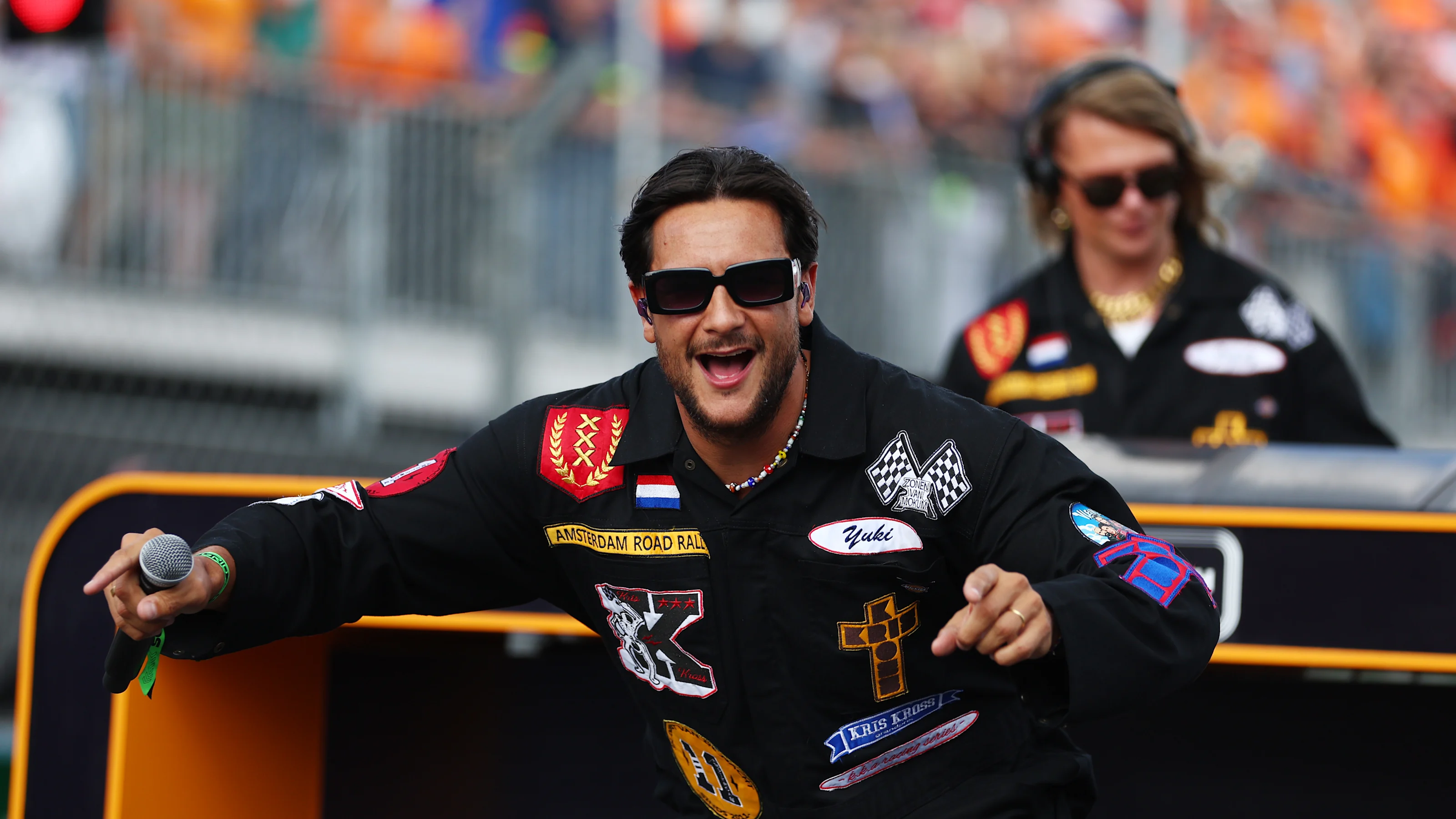 ZANDVOORT, NETHERLANDS - AUGUST 25: A singer performs on the grid during the F1 Grand Prix of