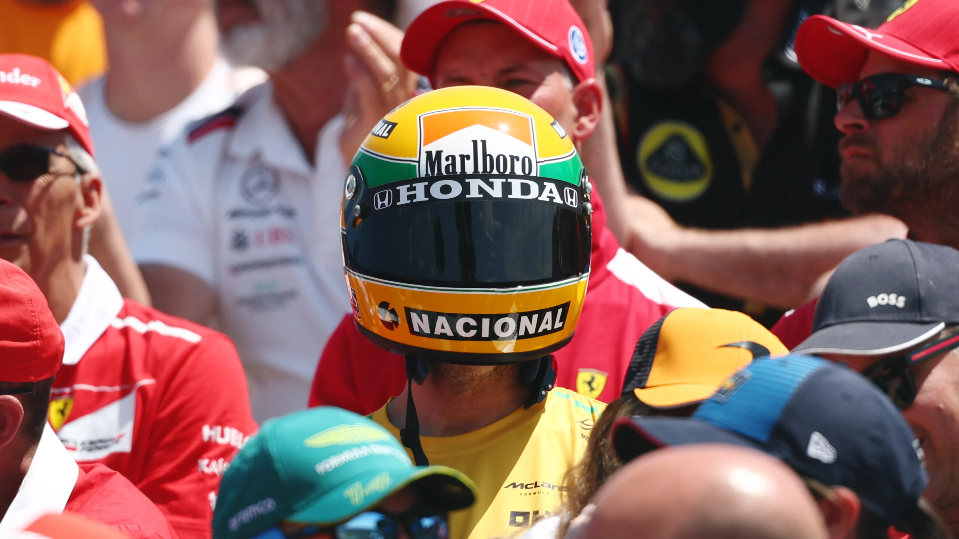 MONTREAL, QUEBEC - JUNE 15: A fan wearing an Ayrton Senna helmet prior to the F1 Grand Prix of