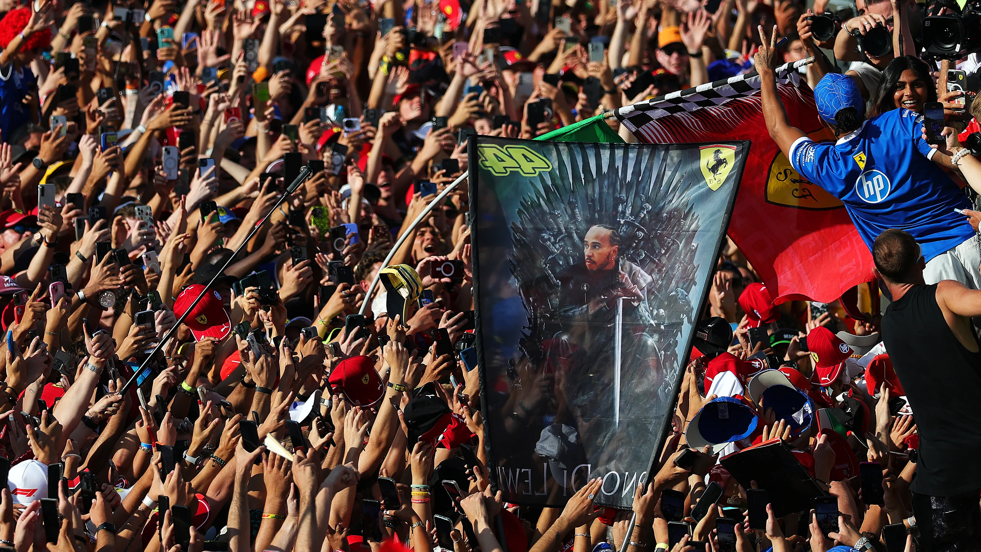 MONZA, ITALY - SEPTEMBER 07: Fans flood the track in celebration after the race during the F1 Grand