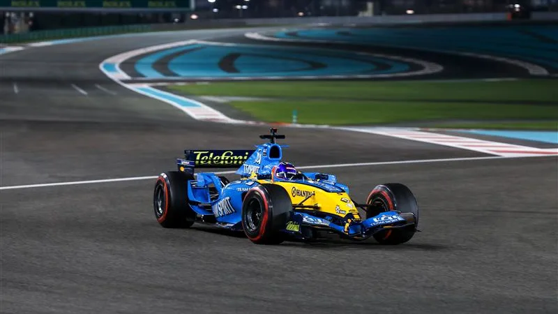 Fernando Alonso took to the Yas Marina Circuit in his 2005 Championship-winning car, the Renault R25. Swipe for more images