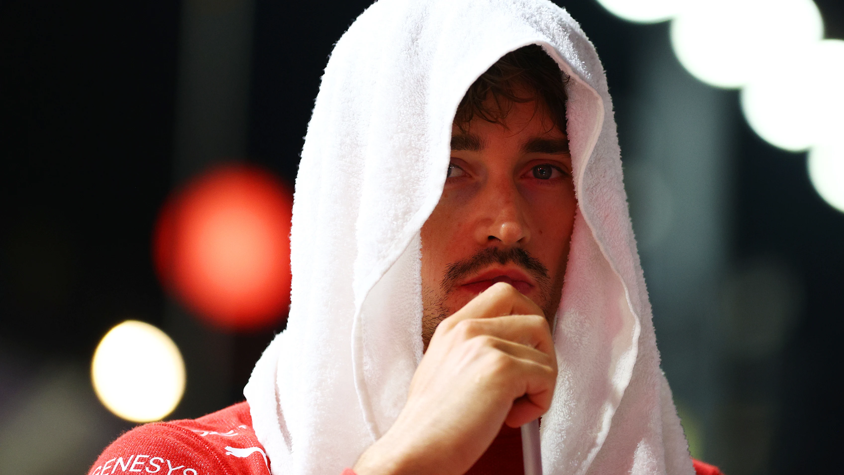 SINGAPORE, SINGAPORE - SEPTEMBER 22: Charles Leclerc of Monaco and Ferrari prepares on the grid