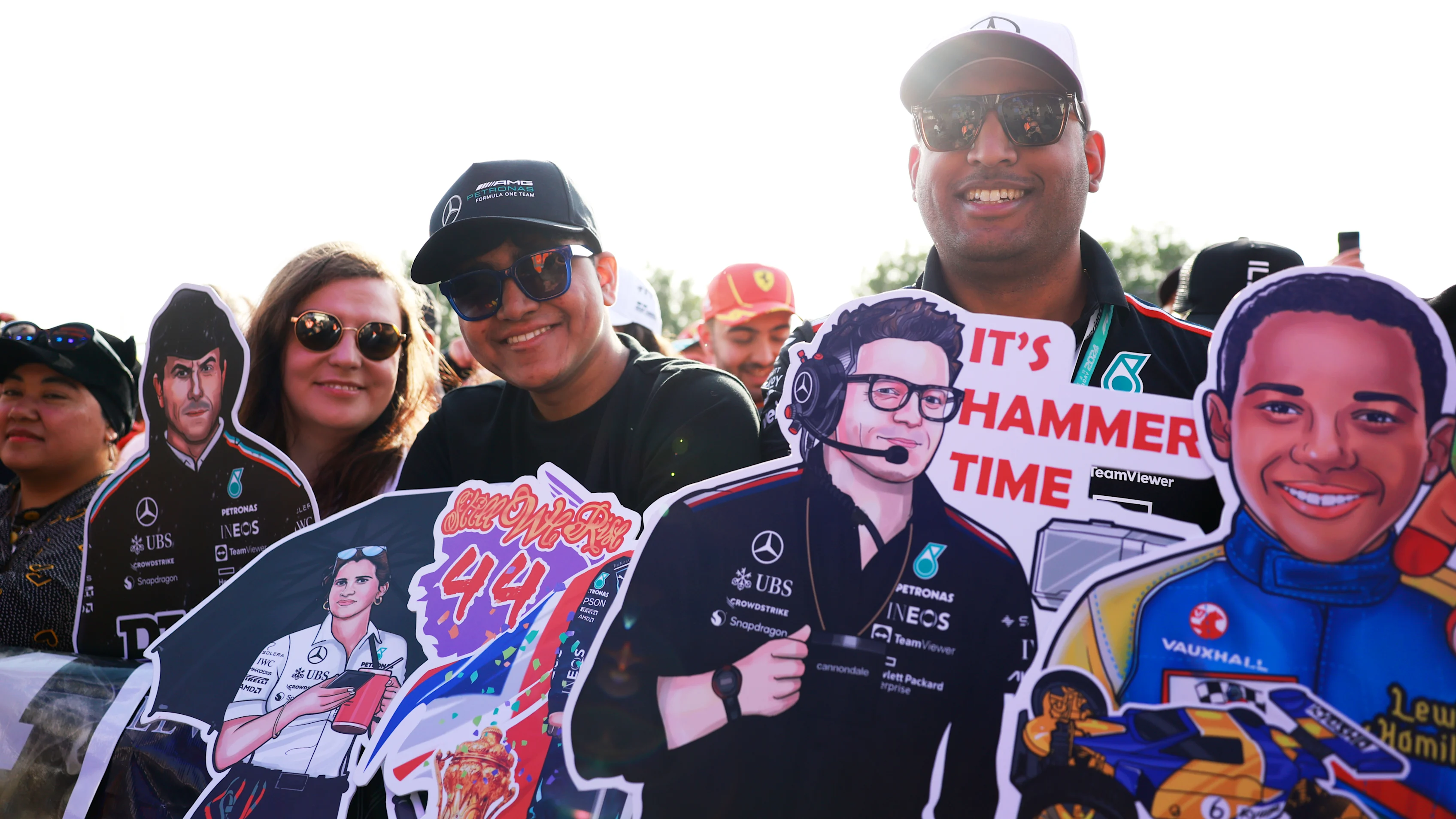 LUSAIL CITY, QATAR - NOVEMBER 30: Lewis Hamilton of Great Britain and Mercedes fans show their