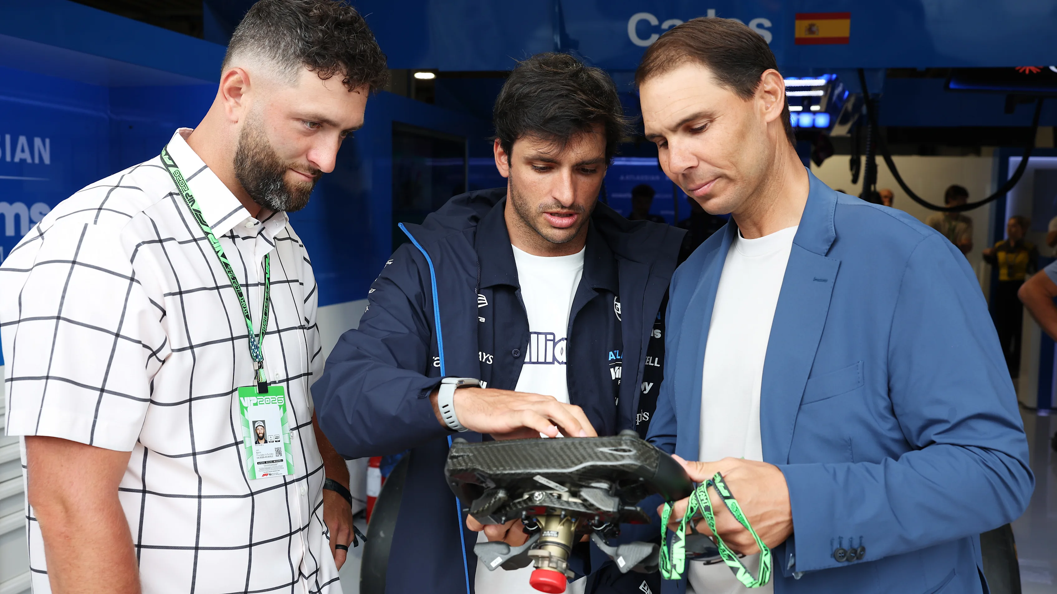 Sainz gave compatriots Nadal and Rahm a lesson in steering wheel mechanics in the Williams garage. Swipe for more images