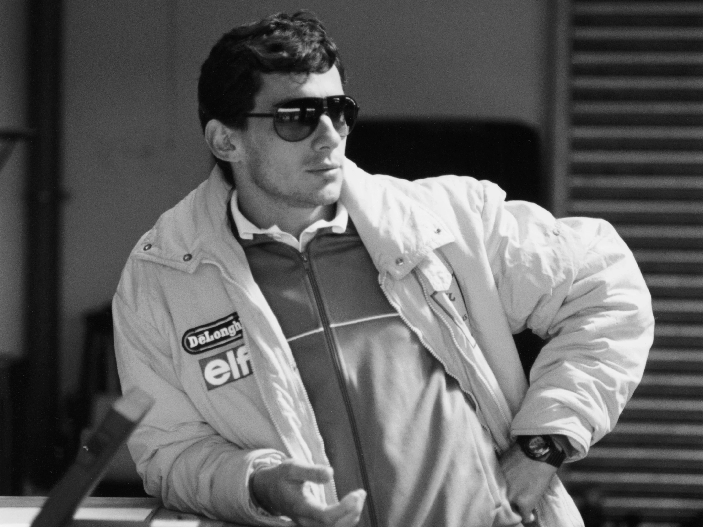 A sophisticated look from the Lotus driver. Swipe to see more images