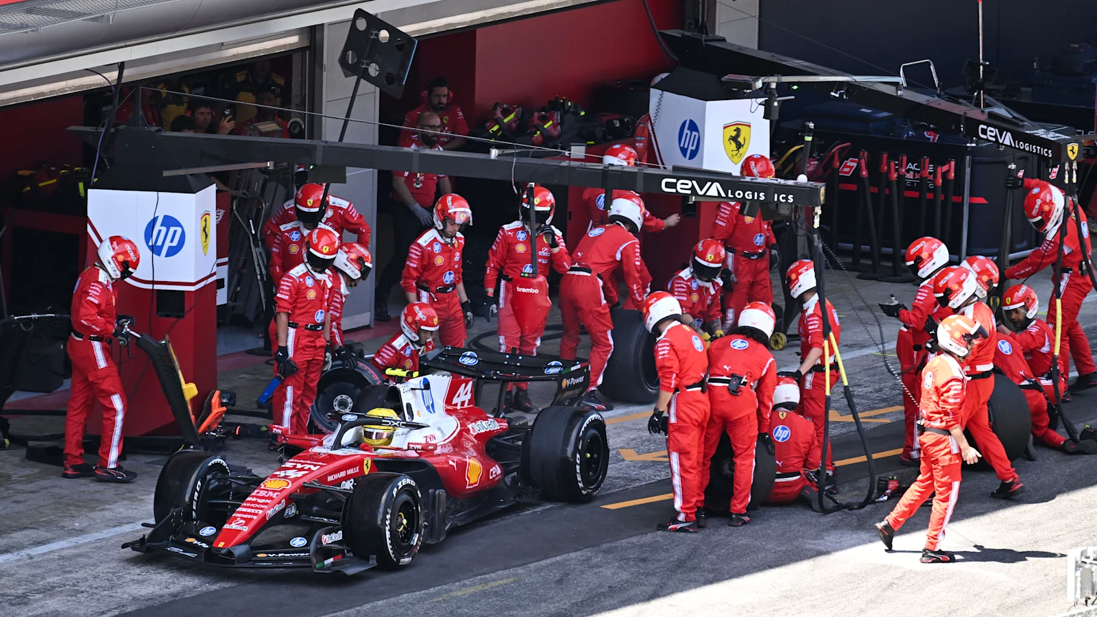 Lewis Hamilton’s Ferrari SF-26 at a pit stop during the 2026 Barcelona-Catalunya Grand Prix. Illustrative Formula 1 photograph.