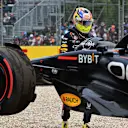 Red Bull Racing's Mexican driver Sergio Perez looks on as marshals remove his car from the side of the track during the qualifying round of the 2023 Formula One Australian Grand Prix at the Albert Park Circuit in Melbourne on April 1, 2023. (Photo by Paul CROCK / AFP) / -- IMAGE RESTRICTED TO EDITORIAL USE - STRICTLY NO COMMERCIAL USE -- (Photo by PAUL CROCK/AFP via Getty Images)