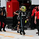 Mercedes' British driver Lewis Hamilton walk to a weigh in after the qualifying session for the 2023 Miami Formula One Grand Prix at the Miami International Autodrome in Miami Gardens, Florida, on May 6, 2023. (Photo by CHANDAN KHANNA / POOL / AFP) (Photo by CHANDAN KHANNA/POOL/AFP via Getty Images)
