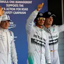 (L to R): Valtteri Bottas (FIN) Williams, pole sitter Lewis Hamilton (GBR) Mercedes AMG F1 and Nico Rosberg (GER) Mercedes AMG F1 celebrate in parc ferme. Formula One World Championship, Rd16, Russian Grand Prix, Qualifying, Sochi Autodrom, Sochi, Krasnodar Krai, Russia, Saturday, 11 October 2014 © Sutton Images. No reproduction without permission