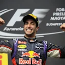 Race winner Daniel Ricciardo (AUS) Red Bull Racing celebrates on the podium. Formula One World Championship, Rd11, Hungarian Grand Prix, Race Day, Hungaroring, Hungary. Sunday, 27 July 2014 © Sutton Images. No reproduction without permission