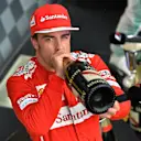 Second placed finisher Fernando Alonso (ESP) Ferrari drinks champagne On the podium. Formula One World Championship, Rd11, Hungarian Grand Prix, Race Day, Hungaroring, Hungary. Sunday, 27 July 2014 © Sutton Images. No reproduction without permission