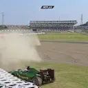 Home favourite Kamui Kobayashi loses the rear of his Caterham CT05 through the S Curves, and is pitched backwards into the barriers © FOWC Ltd