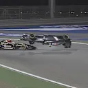 Pastor Maldonado's Lotus collides with the Sauber of Esteban Gutierrez at Turn 1, flipping it over and bringing out the safety car. © FOWC Ltd
