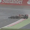 As conditions worsen, Romain Grosjean's Lotus slides sideways across the line. © FOWC Ltd