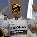 Race winner Lewis Hamilton (GBR) Mercedes AMG F1 celebrates on the podium. Formula One World Championship, Rd3, Bahrain Grand Prix, Race, Bahrain International Circuit, Sakhir, Bahrain, Sunday, 6 April 2014