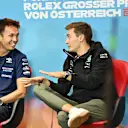 Williams' Thai driver Alexander Albon (L) and Mercedes' British driver George Russell chat during a press conference on July 7, 2022 prior to the Formula One Austrian Grand Prix in Spielberg, Austria. (Photo by Joe Klamar / AFP) (Photo by JOE KLAMAR/AFP via Getty Images)