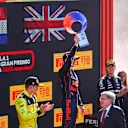 MONZA, ITALY - SEPTEMBER 11: A general view as Race winner Max Verstappen of the Netherlands and Oracle Red Bull Racing celebrates on the podium during the F1 Grand Prix of Italy at Autodromo Nazionale Monza on September 11, 2022 in Monza, Italy. (Photo by Mark Thompson/Getty Images)