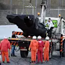 The car of Jenson Button (GBR) McLaren MP4-30 is recovered after stopping on track at Formula One Testing, Day Two, Barcelona, Spain, 27 February 2015.

