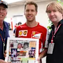 Keith Sutton (GBR) Sutton Images CEO, Sebastian Vettel (GER) Ferrari and Mark Dickens (GBR) Artist with the Jochen Rindt World Champions in Art depiction at Formula One World Championship, Rd16, United States  Grand Prix, Preparations, Austin, Texas, USA, Thursday 22 October 2015. © Sutton Motorsport Images