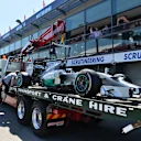 The car of Lewis Hamilton (GBR) Mercedes AMG F1 W05 is recovered to the pits. Formula One World Championship, Rd1, Australian Grand Prix, Practice, Albert Park, Melbourne, Australia, Friday, 14 March 2014