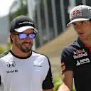 Fernando Alonso (ESP) McLaren and Carlos Sainz jr (ESP) Scuderia Toro Rosso at Formula One World Championship, Rd2, Malaysian Grand Prix, Preparations, Sepang, Malaysia, Thursday 26 March 2015. © Sutton Motorsport Images