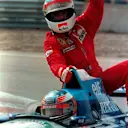 Jean Alesi (CDN) Ferrari celebrates his only victory in Formula One whilst being given a lift back to the pits by Michael Schumacher (GER) Benetton B195.
Canadian Grand Prix, Montreal, 11 June 1995. ©  Sutton Motorsport Images