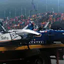 The wrecks are towed away after the first corner accident
Formula One World Championship, Rd 13, Belgian Grand Prix, Spa Francorchamps, Belgium, 30 August 1998 © ©Sutton Motorsport Images