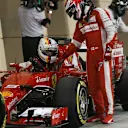 Sebastian Vettel (GER) Ferrari SF15-T and Kimi Raikkonen (FIN) Ferrari in parc ferme at Formula One World Championship, Rd4, Bahrain Grand Prix Qualifying, Bahrain International Circuit, Sakhir, Bahrain, Saturday 18  April 2015. © Sutton Motorsport Images