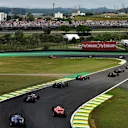 Marcus Ericsson (SWE) Sauber C34 and Will Stevens (GBR) Marussia at the start of the race at Formula One World Championship, Rd18, Brazilian Grand Prix, Race, Interlagos, Sao Paulo, Brazil, Sunday 15 November 2015. © Sutton Motorsport Images